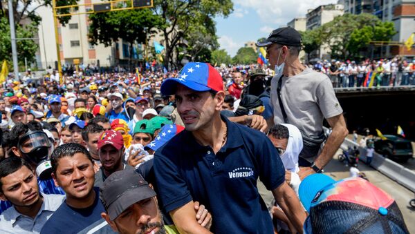 Líder opositor Henrique Capriles participa de protesto contra o presidente venezuelano Nicolás Maduro em Caracas - Sputnik Brasil