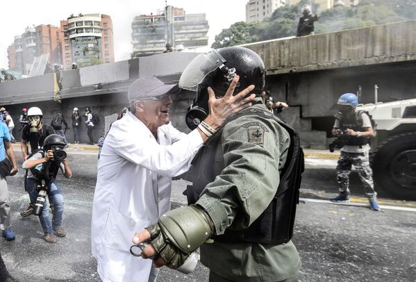 Protestos na capital venezuelana, Caracas - Sputnik Brasil