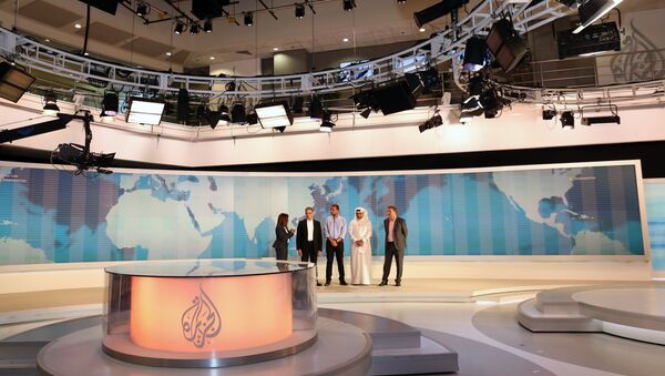 Al-Jazeera channel's newsroom in Doha - Sputnik Brasil