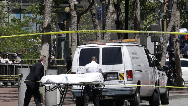 San Francisco Medical Examiners prepare to load a gurney carrying a body into a van in San Francisco (File) - Sputnik Brasil
