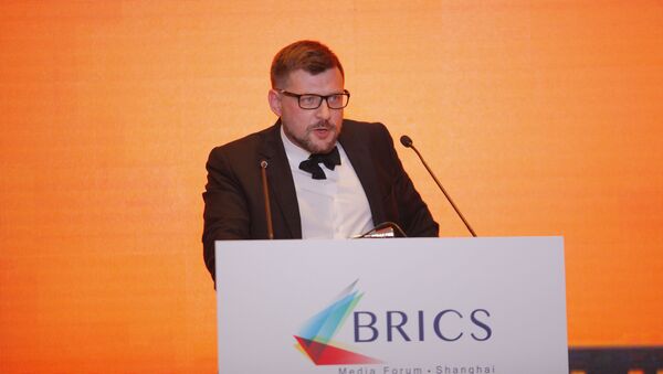 O primeiro vice-editor-chefe da Sputnik, Sergei Kochetkov, durante o fórum de mídia do grupo BRICS, em Xangai - Sputnik Brasil