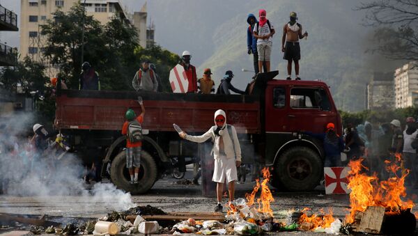 Protestos antigovernamentais na capital venezuelana, Caracas - Sputnik Brasil