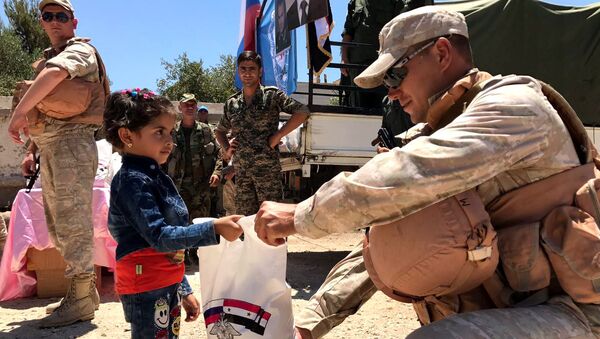 Centro russo de Reconciliação na Síria entrega ajuda humanitária ao povo sírio - Sputnik Brasil
