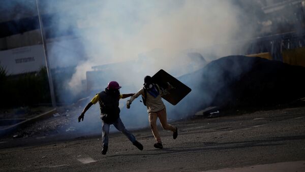 Protestas en Caracas, Venezuela - Sputnik Brasil