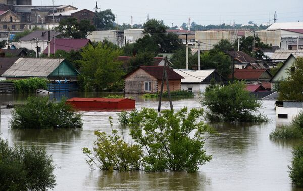 Edifícios atingidos na sequência  de uma inundação na cidade russa de Ussuriysk - Sputnik Brasil