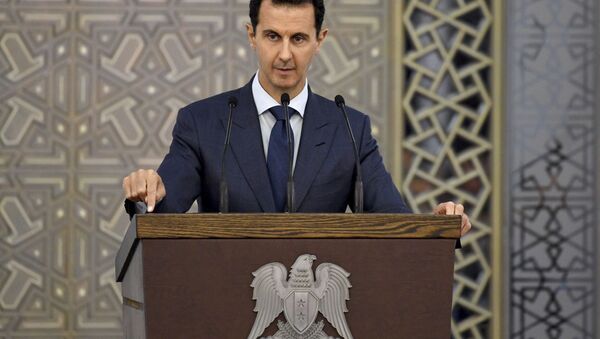 O presidente sírio Bashar Assad durante um discurso em frente dos diplomatas, em 20 de agosto de 2017 - Sputnik Brasil