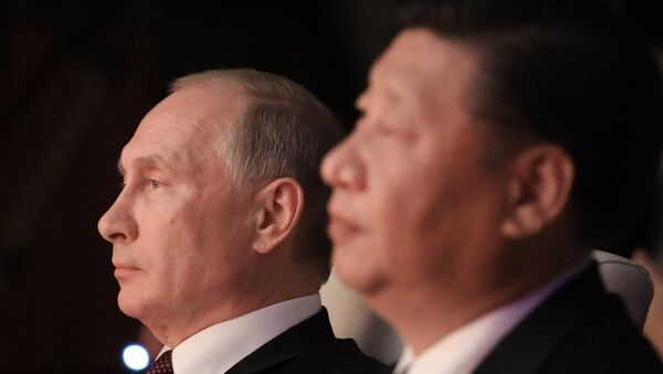 Presidente russo, Vladimir Putin, com seu homólogo chinês, Xi Jinping, assiste concerto em Xiamen, China, 3 de setembro de 2017 - Sputnik Brasil
