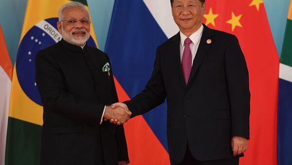 O líder chinês, Xi Jinping, e o primeiro-ministro indiano, Narendra Modi. - Sputnik Brasil