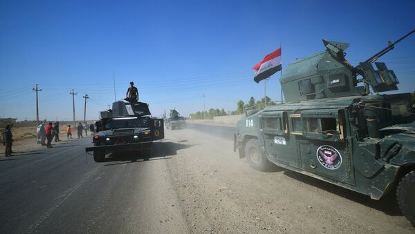 Members of Iraqi federal forces gather to continue to advance in military vehicles in Kirkuk, Iraq - Sputnik Brasil
