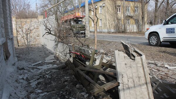 Aftermath of shelling in the town of Luganskoye in the Donetsk Region. File photo - Sputnik Brasil